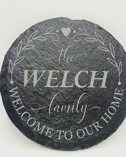 Personalized Laser Engraved Slate Coaster featuring "The WELCH family" and "Welcome to our home" engraving. Add a unique touch to your space while protecting your surfaces. Shop now for personalized sophistication.